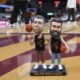Brothers Travis and Jason Kelce honored with bobblehead giveaway at Cavs game