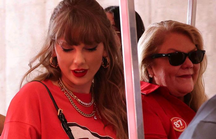 News Update: Taylor Swift's Mom Andrea Reps Travis Kelce — and Her Daughter! — with 'In My 87 Era' Pin at Chiefs Game...see more