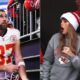 This Is Emotional: Taylor Swift Rushes to the Field, Kisses Travis Kelce After Chiefs Victory Over Raiders In a heartwarming moment that has taken the internet by storm, pop sensation Taylor Swift celebrated the Kansas City Chiefs' thrilling victory over the Las Vegas Raiders by rushing onto the field to embrace and kiss star tight end Travis Kelce. The Chiefs secured a commanding win, and the moment between Swift and Kelce was the perfect cherry on top for fans watching the action unfold. Captured on video and now trending across social media, Swift was seen standing in a VIP box throughout the game, cheering enthusiastically as Kelce put on a stellar performance. When the final whistle blew, she made her way down to the field. In front of a roaring crowd at Arrowhead Stadium, the couple shared an emotional embrace, showcasing their blossoming romance. The video, which has amassed millions of views within hours, shows the connection between Swift and Kelce bringing a new kind of excitement to Chiefs games. Fans of both the NFL and the singer are buzzing about the display, with many dubbing them "America’s favorite power couple." This isn’t the first time Swift has been spotted at a Chiefs game, but this dramatic celebration has cemented her role as Kelce’s biggest cheerleader. As the Chiefs march toward playoff glory, one thing is clear: this love story is a touchdown for fans everywhere. Watch the viral moment below!