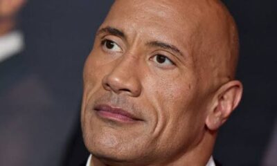 **Breaking News: Popular American Actor and Wrestler Dwayne 'The Rock' Johnson Passes Away Today** In a heartbreaking turn of events, Dwayne "The Rock" Johnson, the beloved actor, producer, and former professional wrestler, has passed away today at the age of [insert age]. Johnson, who was known for his charismatic personality, immense talent, and philanthropic efforts, has left an indelible mark on both Hollywood and the world of professional wrestling. Fans across the globe are mourning the loss of the larger-than-life figure, whose career spanned decades. From his rise as a WWE superstar to becoming one of the highest-paid actors in Hollywood, Johnson's journey was nothing short of extraordinary. His films, including *Jumanji*, *Fast & Furious*, and *The Scorpion King*, solidified him as one of the most recognizable stars in the entertainment industry. In addition to his on-screen success, Johnson was admired for his down-to-earth personality, genuine kindness, and generosity. His social media presence, where he often shared motivational messages, glimpses of his family life, and messages of gratitude for his fans, made him even more beloved by millions. Beyond his entertainment career, Johnson was a dedicated philanthropist. He established the *Dwayne Johnson Rock Foundation*, which has donated millions to children and families in need, and his unwavering support for causes such as veterans' rights, mental health awareness, and the fight against childhood cancer further cemented his legacy as a compassionate public figure. The cause of his passing has not yet been confirmed, and his family has asked for privacy during this difficult time. Tributes have already begun pouring in from fans, fellow celebrities, and athletes, all of whom have expressed their shock and sorrow at the loss of such an iconic figure. Johnson's legacy will live on through his work, his contributions to the community, and the millions of lives he touched with his positivity and strength. He will be remembered not just as a star, but as a genuine and inspiring individual who truly cared for the people around him. Fans are encouraged to share their memories and condolences on social media as the world mourns the loss of a legend.