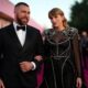 JUST IN: Taylor Swift and Travis Kelce Steal the Spotlight at the 2025 Kentucky Derby with a Stunning Grand Entrance Louisville, KY – May 3, 2025 The 2025 Kentucky Derby wasn’t just about the horses this year—it was about the unmatched star power of pop icon Taylor Swift and NFL superstar Travis Kelce. The couple made a grand, show-stopping entrance that had fans screaming, photographers scrambling, and the internet buzzing within minutes. Arriving hand-in-hand at Churchill Downs, Swift and Kelce turned heads with their bold fashion choices. Taylor stunned in a custom pastel pink dress adorned with hand-embroidered floral accents, a wide-brimmed hat tilted just right, and sparkling heels that caught the sun with every step. Travis matched her elegance with a sharply tailored white suit paired with a patterned lavender tie and coordinating pocket square—his confident stride and megawatt smile completing the look. The couple posed for photos, waved at excited fans, and even took a few selfies with lucky attendees before heading into the exclusive Millionaires Row section. Observers described the atmosphere as electric. “They didn’t just walk in—they owned the moment,” one Derby guest shared. “You could feel the excitement shift when they arrived. Everyone was craning their necks to catch a glimpse.” This appearance marks yet another high-profile moment for the couple, who have dominated headlines over the past year both for their relationship and individual successes. While Taylor continues her record-breaking Eras Tour, Kelce is fresh off another powerful NFL season and multiple TV appearances. Social media erupted shortly after their arrival, with hashtags like #SwiftKelceDerby and #TaylorAndTravis trending globally. One fan tweeted, “Forget the horses—Taylor and Travis just won the Kentucky Derby red carpet!” As the races continued, it was clear that for many in attendance, the true highlight of the day had already galloped in—on two feet, not four.